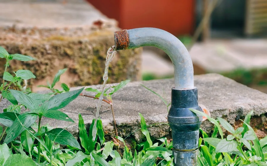 Outdoor faucet spigot showing the wear and mineral buildup common in Mesa Arizona homes