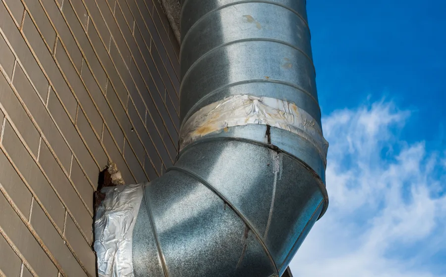 Exterior plumbing line typical of Gilbert Arizona homes affected by soil movement